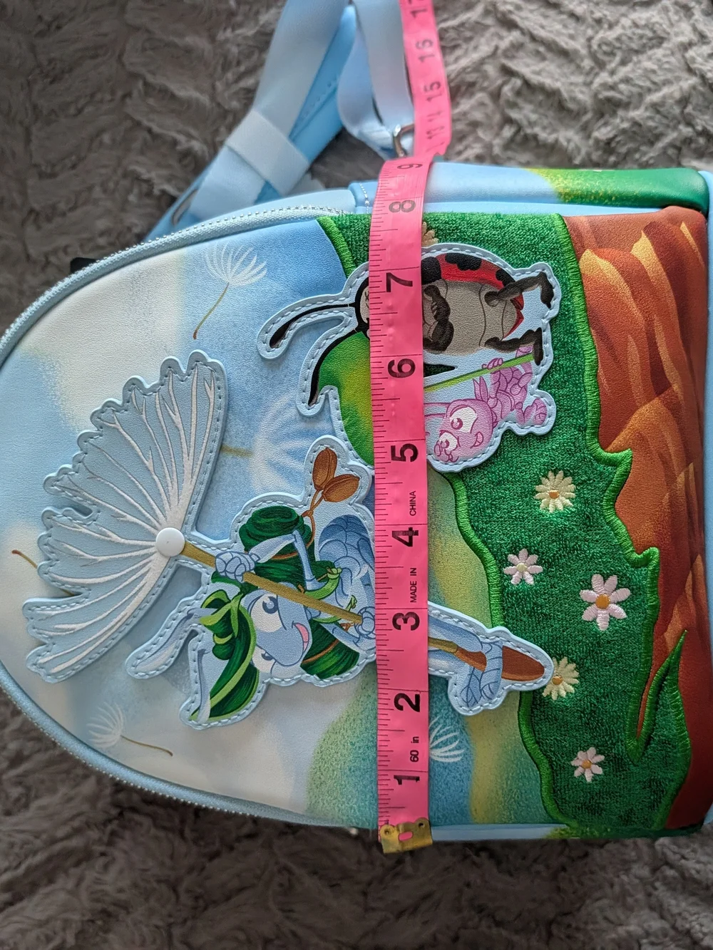 Loungefly Light Blue Kids Mini Backpack with Playful Nature Characters